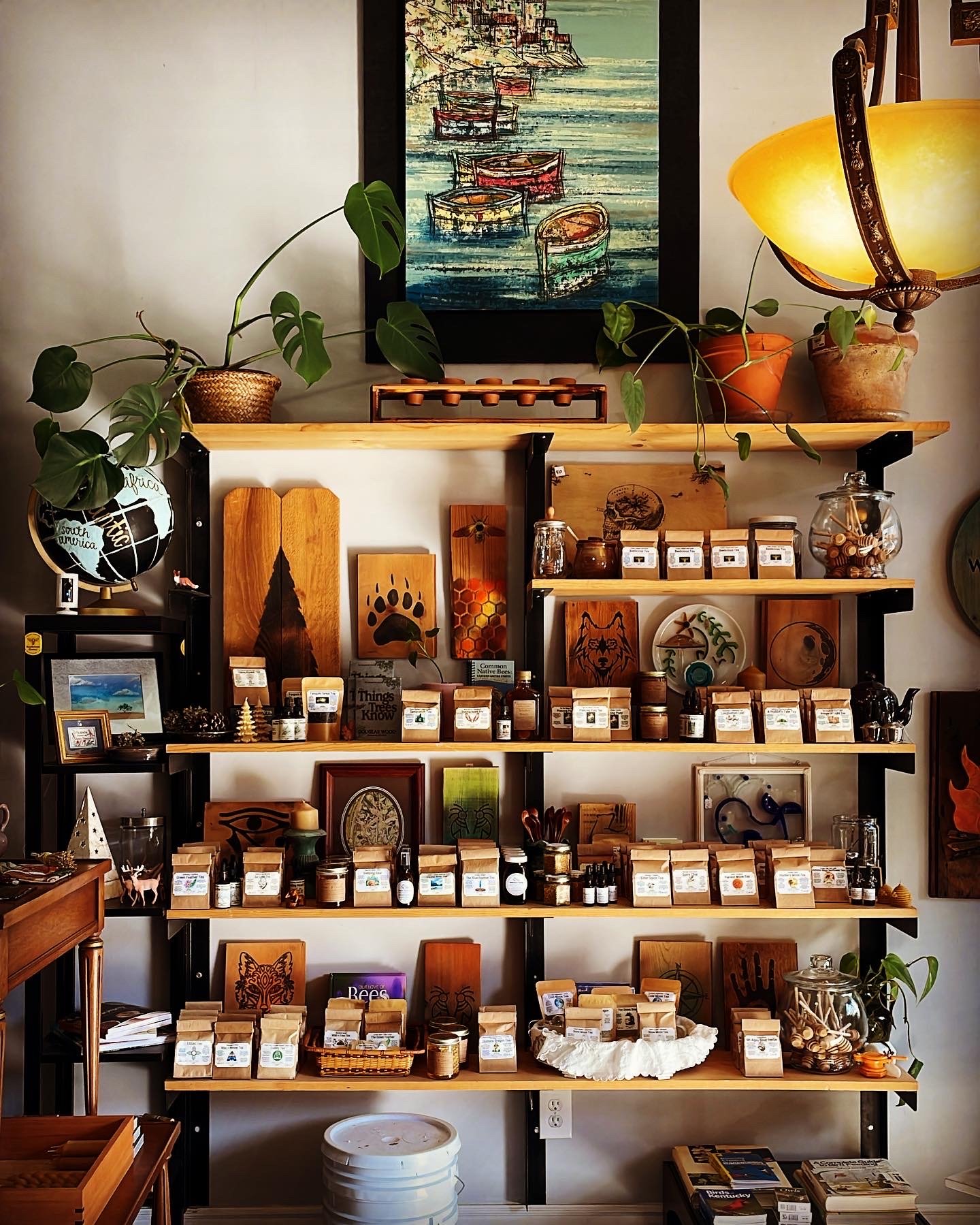 Shelves of honey, candles and local goods inside the Beelicious shop on Elm Street